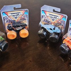 Set Of 4 Monster Jam Mini Trucks. Brand New Sealed!