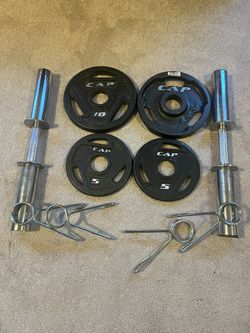 2” Golds, Gym, Olympic Bar Bells 20”. Includes 2 Sets, Barbell Clamps And 30 Lbs  Weights.