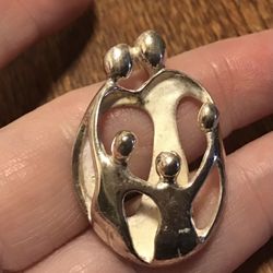 Sterling Carolyn Pollack family pendant with three children