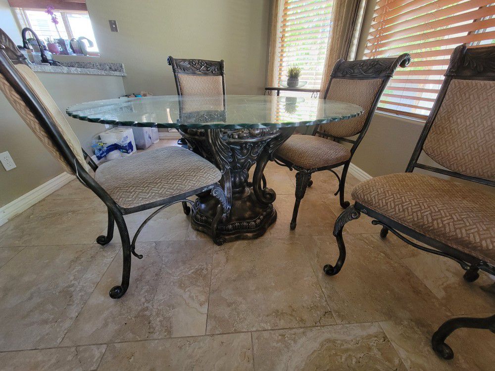 Large Round Glass Top Table With Heavy Metal Bronze Pedestal With Four Chairs