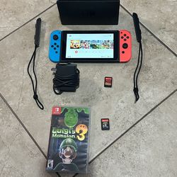 Nintendo Switch w/2 Free Games  (Ave J Pickup)