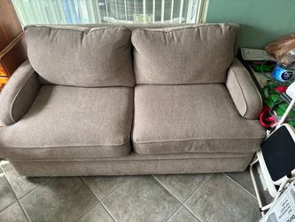 Genuine, La-Z-Boy Natural beige , love seat, Couch with  bed inside , barely used. 70 “ wide , 37 “ depth. 32” high . $300