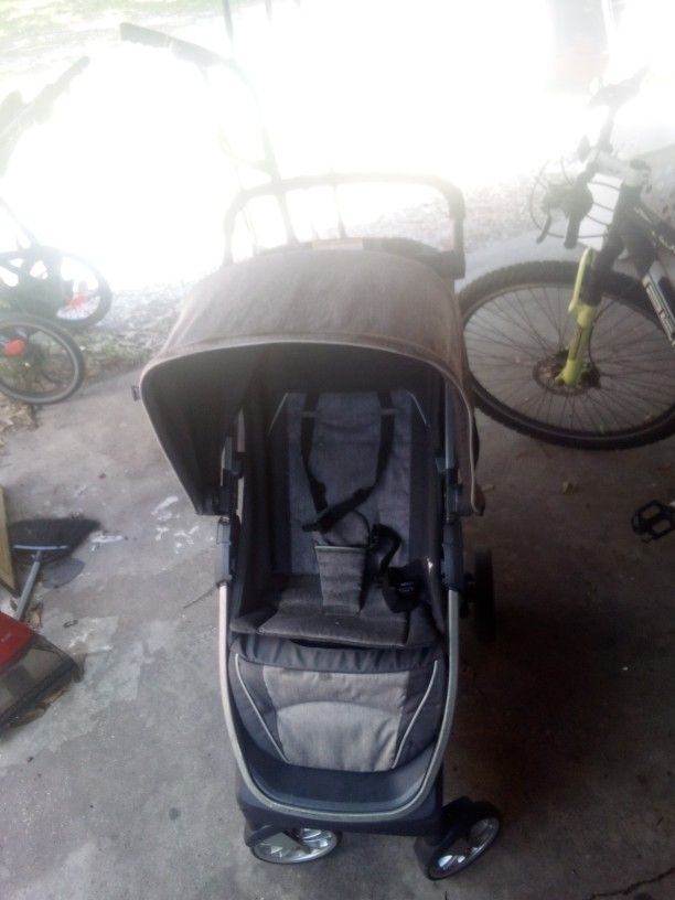 Strollers And Car Seats And Baby Carrier