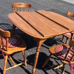 Dining table with four chairs good condition