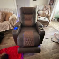 Brown power recliner w/ cup holder isb power and LED