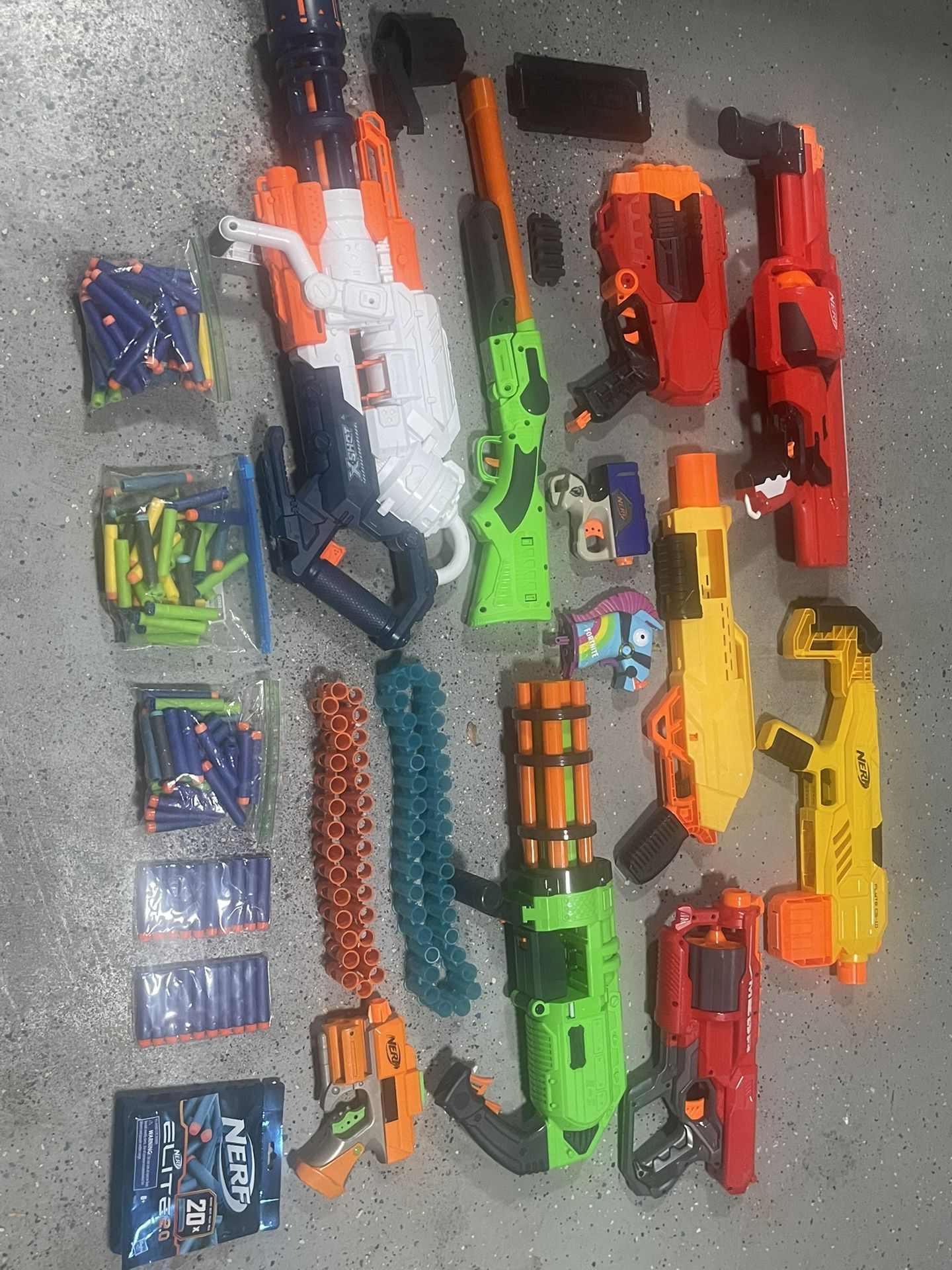 Assorted Nerf Guns And Darts