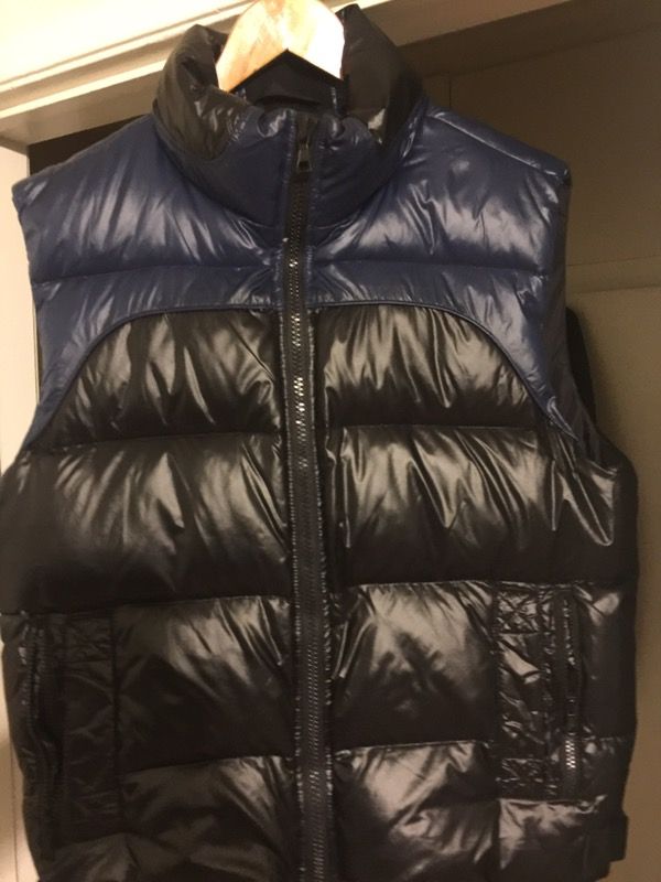 Cool blue and black vest well fitted with comfort