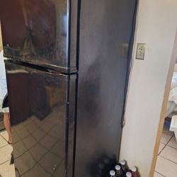 Whirlpool refrigerator black good condition.  $75 or best offer
