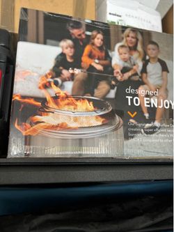 Brand new fire pit inbox $100