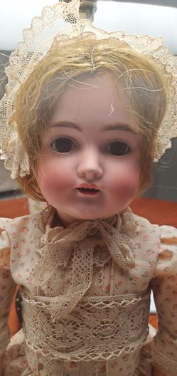 Porcelain bisque large antique doll