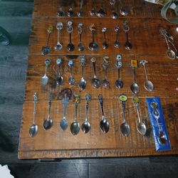 Thirty three collectible spoons from around the world and the united states