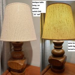 Classic bedside or table lamp with wooden base and lampshade