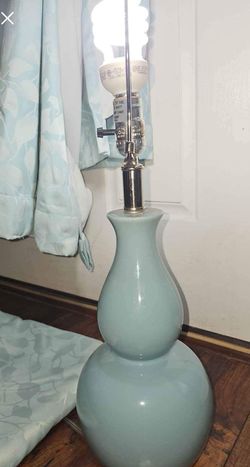 Blue lamp with matching curtains