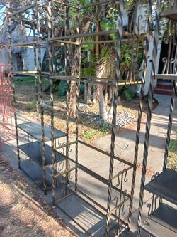 Wrought-iron book shelves etagere