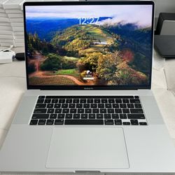 16 inch Macbook Pro W/TouchBar 16 GB Ram. 