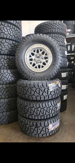17" KMC w/ 33" RT tires. $1700
