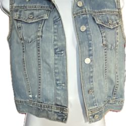 #216 Ladies Medium Gap Denim Vest. Has A Paint Stain In Front