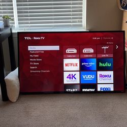 55 inch TCL Roku TV with full motion wall mount