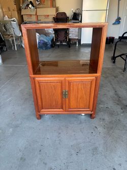 Solid wood cabinet with wheels