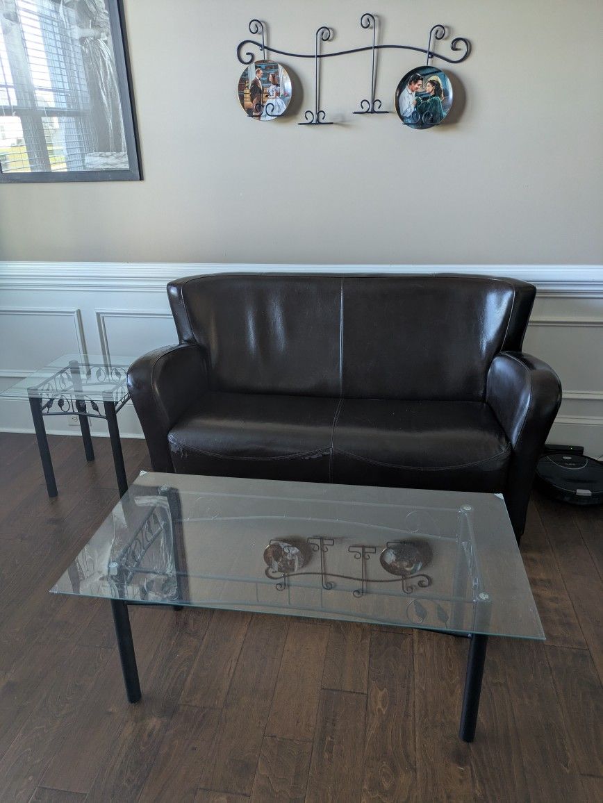 Loveseat and Glass And Metal Tables
