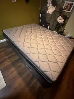 Black, Queen Sized BedFrame and Spring Mattress