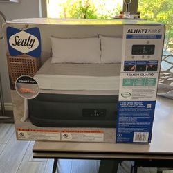 Sealy - Queen Air Mattress  (One Time Used Only )