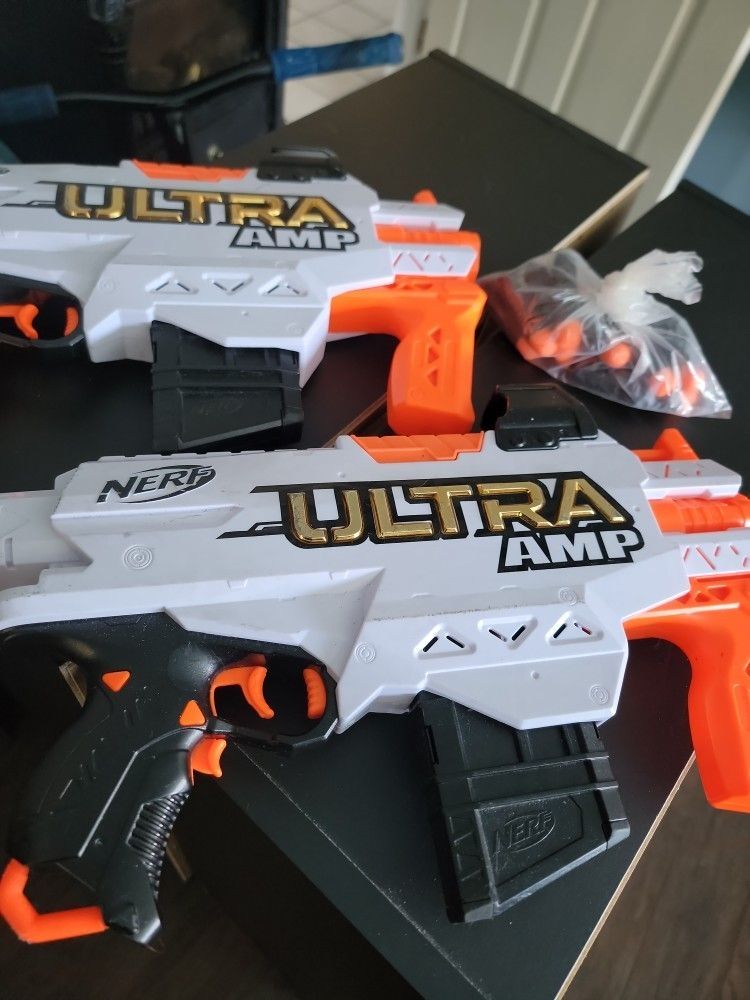 NERF PAIR OF ULTRA AMP PLAY GUNS W BULLETs