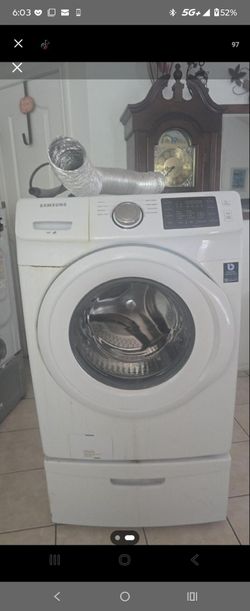 Frontload washer and dryer with pedestals