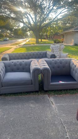 Cuffed Sofa with chairs
