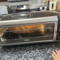 Ninja SP101 Digital Air Fry Countertop Oven with 8-in-1 Functionality, Flip Up & Away Capability for Storage Space, with Air Fry Basket, Wire Rack & C
