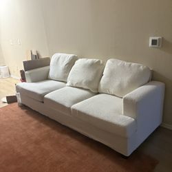 89 in white couch 
