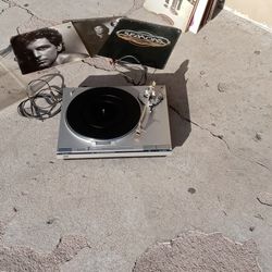 JVC Record Player And A Bunch Of Vinyl Albums