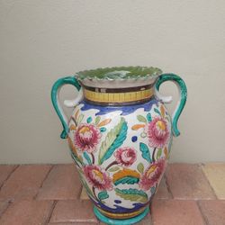 Vintage collectable vase has some chips
