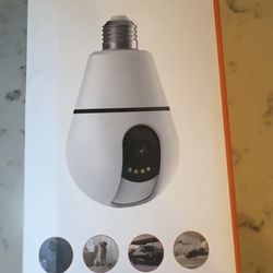 Security camera with wireless light bulb