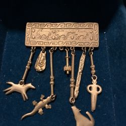 JJ 1988 Pin Gold Tone Brooch Dangle Charms Signed 