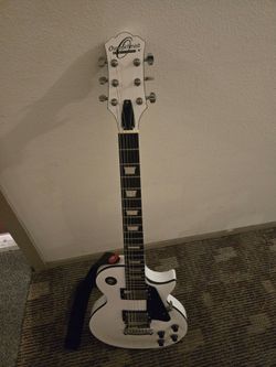Oscar Schmidt by washburn electric guitar and Boss Katana 50 combo