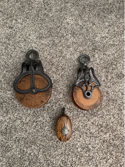 Antique wooden pulleys