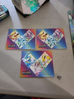 3 sticker sheets from Pokemon Prismatic Evolutions.