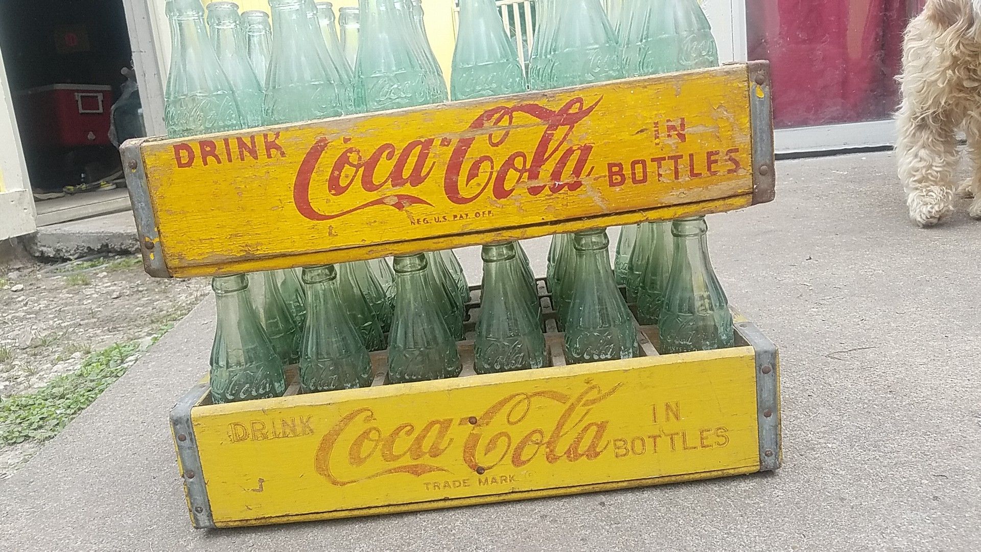 Antique coca cola bottles and crates