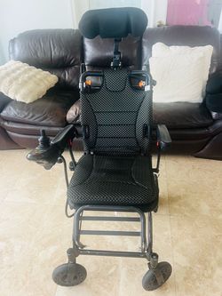 Tilt-in-Space Wheelchair with Headrest and Joystick