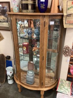 Curio cabinet oak 60”H