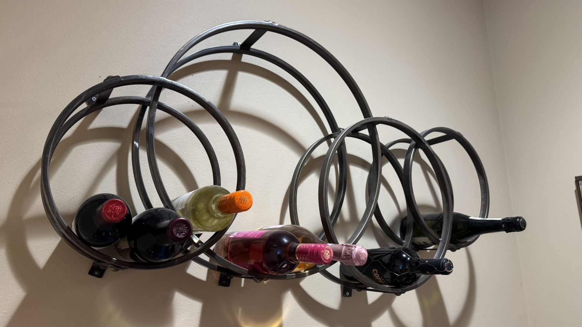 Wall-Mounted Metal Wine Rack – Modern Industrial Design