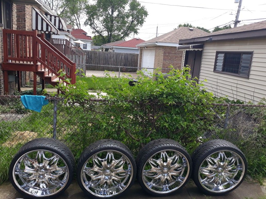 24 inch wheels and tire 5 or 6 lug universal wheel 1400$ best offer