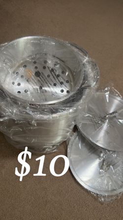 Two large steamer pots