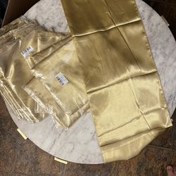 16 Silk Gold Runners With 16 Table Frames and 32 Gold Small Candle Holders. Candles are not Included. 