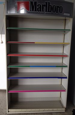 Metal cigarette display shelving unit