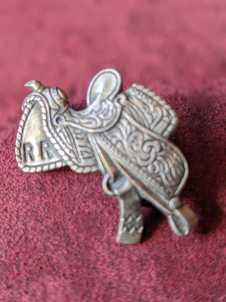 For Sale, Silver Metal Saddle Pin With The Initials RR On It $10