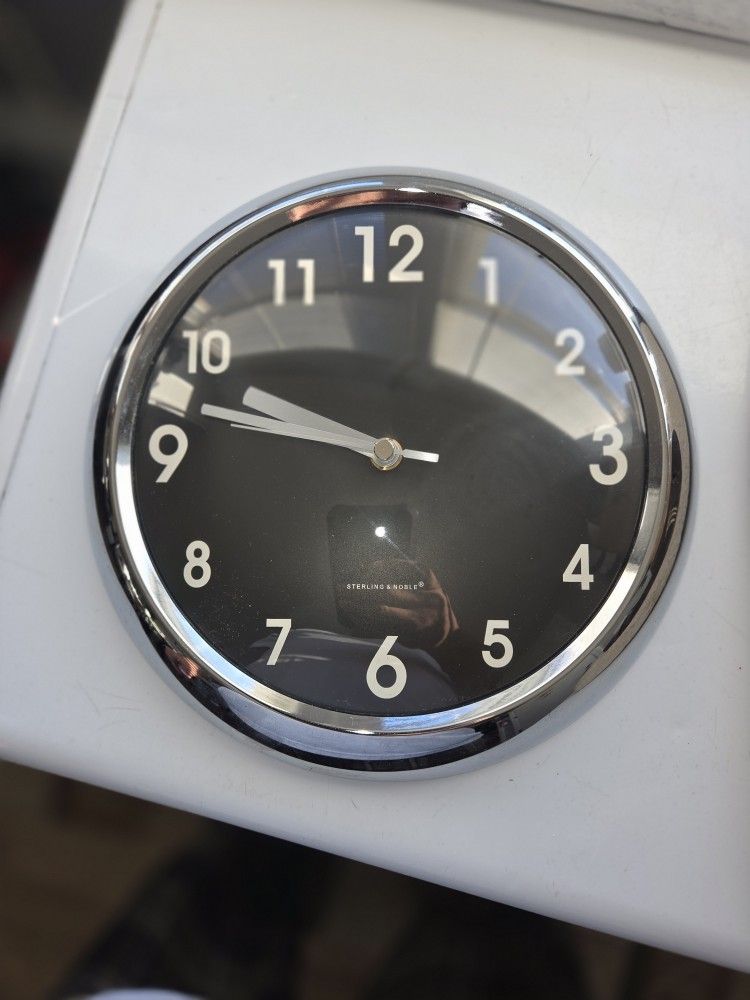 New Chrome And Black Wall Clock $20.00