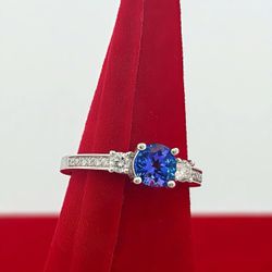 14k Woman’s Diamond Ring With Blue Stone Size 7.5” 0.70 Approx Ctw