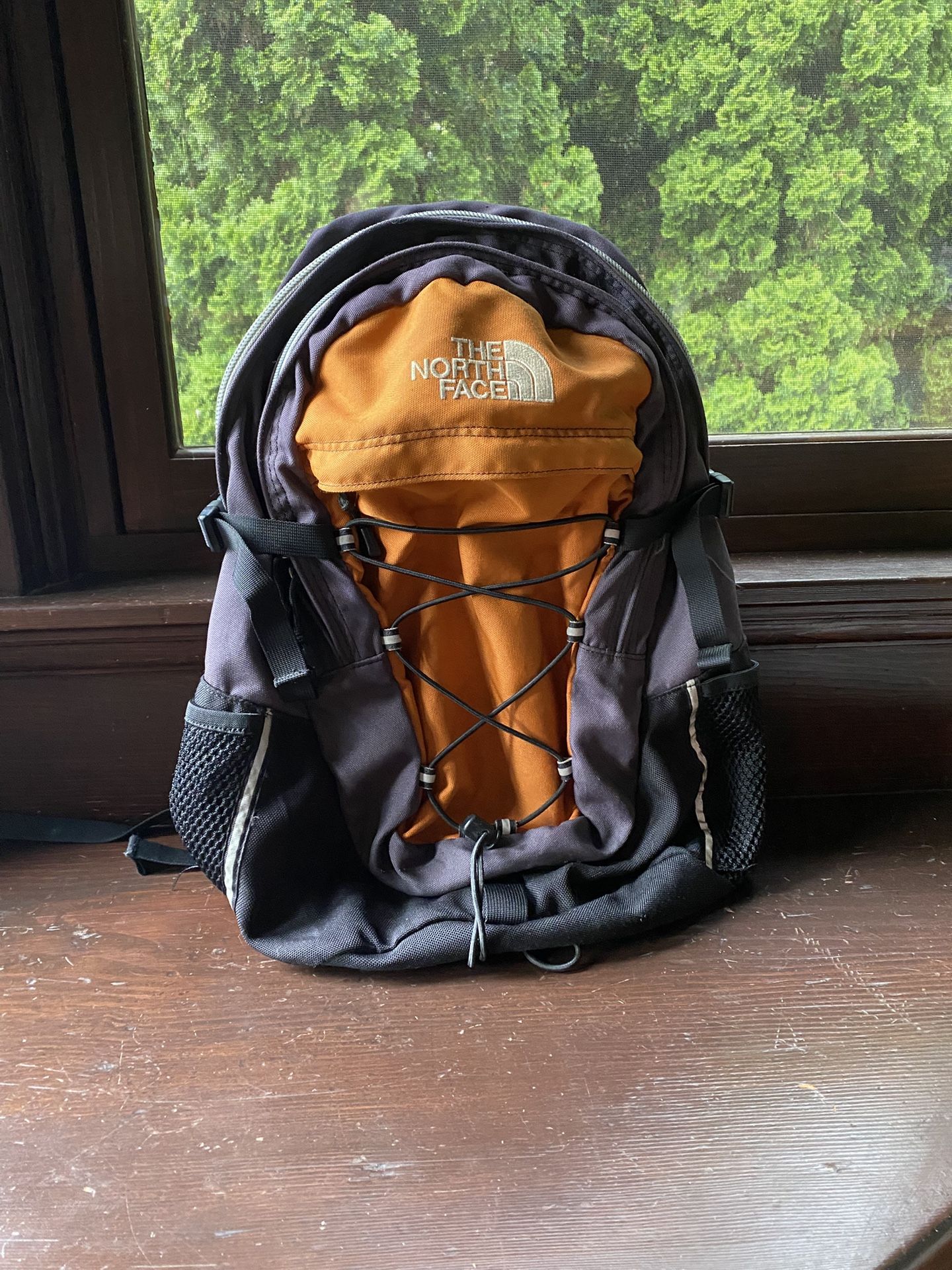 The North Face Orange, Charcoal, and Black Day-Trip Trail Pack or Commuter/School Backpack